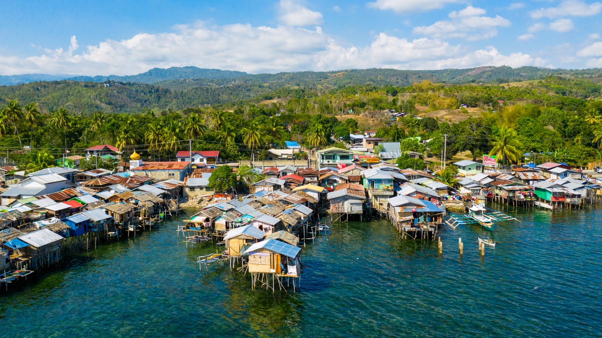 Modern exhibition booth design in the Philippines at Sky Expo trade fair with creative branding and lighting setup